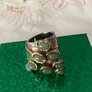 Yves Saint Laurent ring.